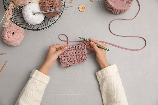 Woman's hands crocheting